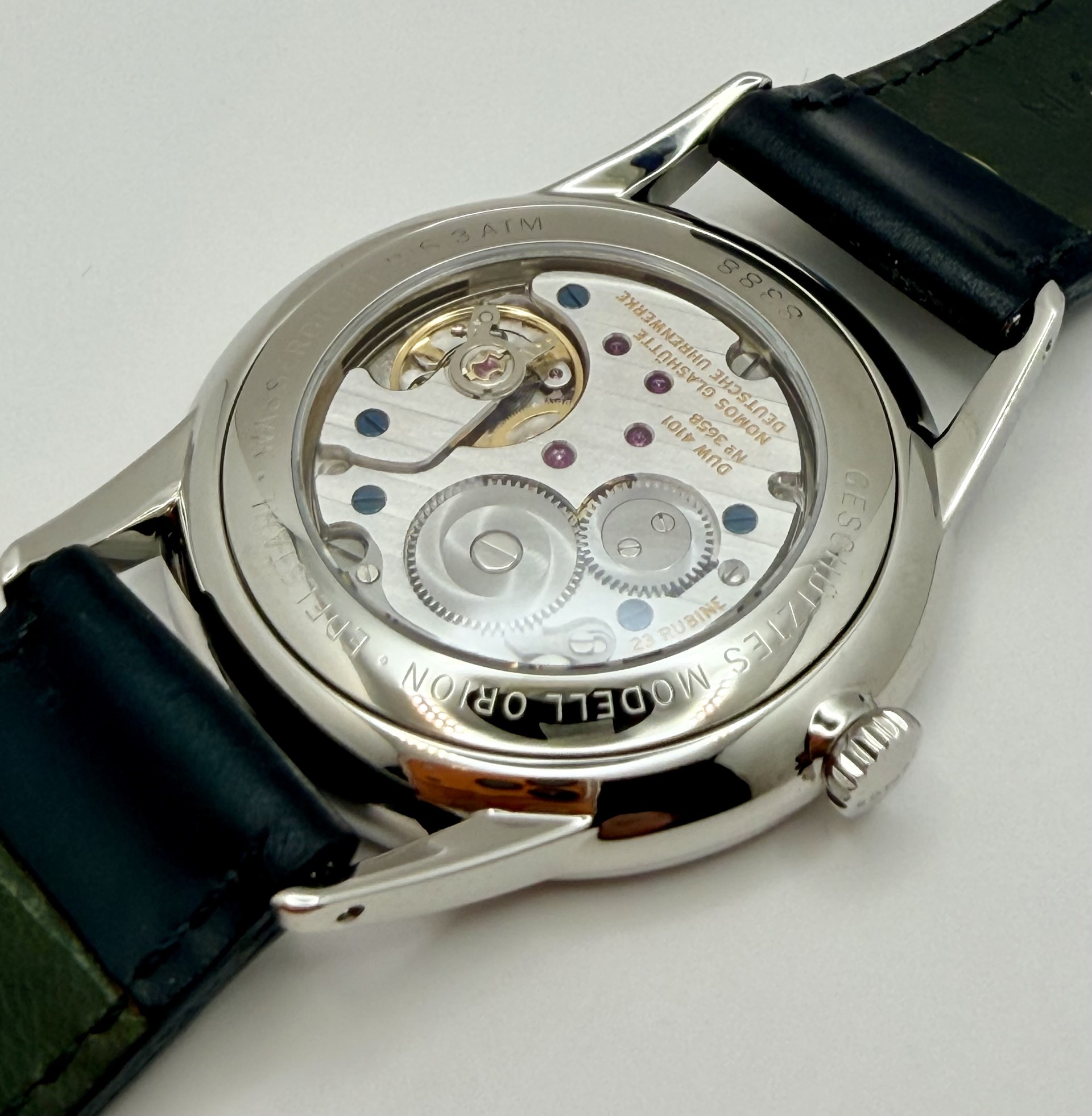 Nomos Orion 38 Datum Weiss Glasboden